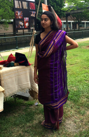 Jaya wearing a purple sari